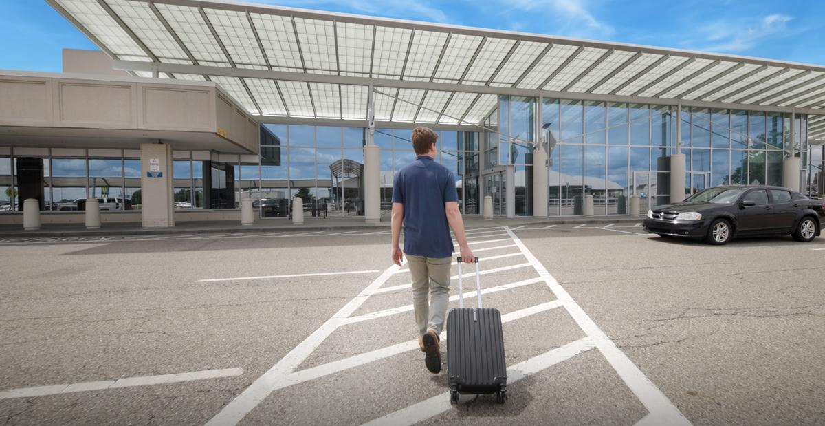 Man walking into CAK